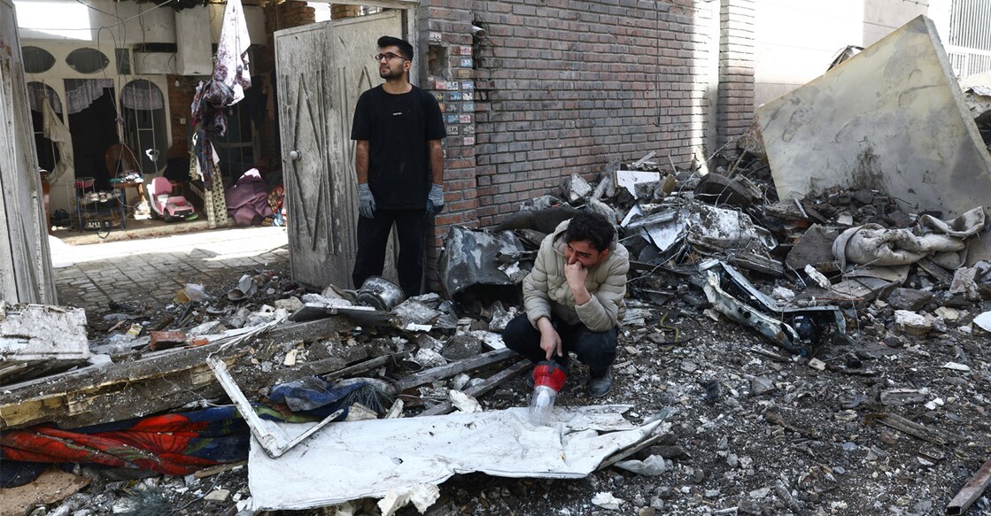 People react at the site of a residential building damaged by a strike, amid the US-Israeli conflict with Iran, in Tehran, Iran, March 27, 2026. Photo: Majid Asgaripour/WANA (West Asia News Agency) via REUTERS