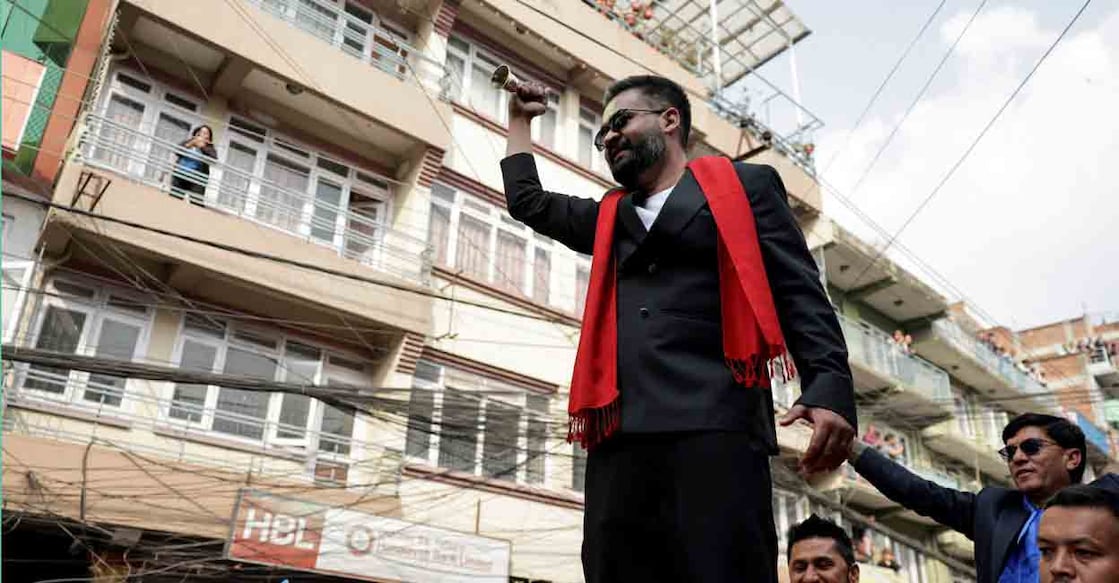 Balendra Shah, a rapper-turned-politician and the prime ministerial candidate for the Rastriya Swatantra Party (RSP), rings a bell, which is the party's symbol, as he takes part in an election campaign in Kirtipur, Kathmandu, Nepal, February 28, 2026. Photo: REUTERS/Navesh Chitrakar