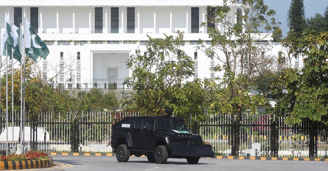 A security vehicle moves past the President house as Pakistan gears up to host the U.S. and Iran for peace talks, in Islamabad, Pakistan, April 9, 2026. Photo: REUTERS/Waseem Khan