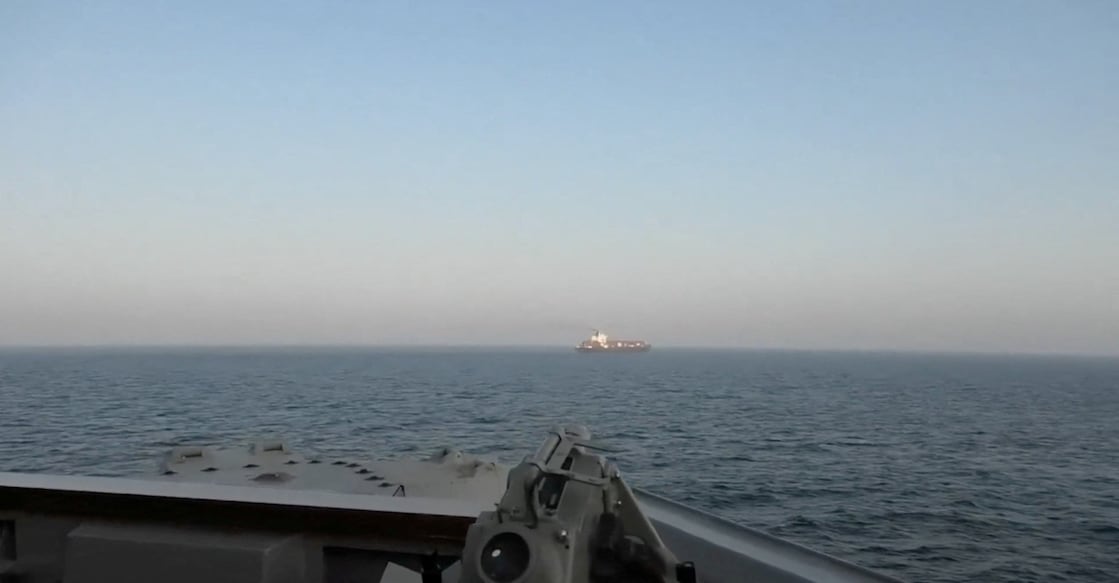 A view of Iranian-flagged cargo ship Touska as USS Spruance (DDG 111) conducts its interception in a location given as the north Arabian Sea, in this screen capture from a video released April 19, 2026. Photo: Reuters. 