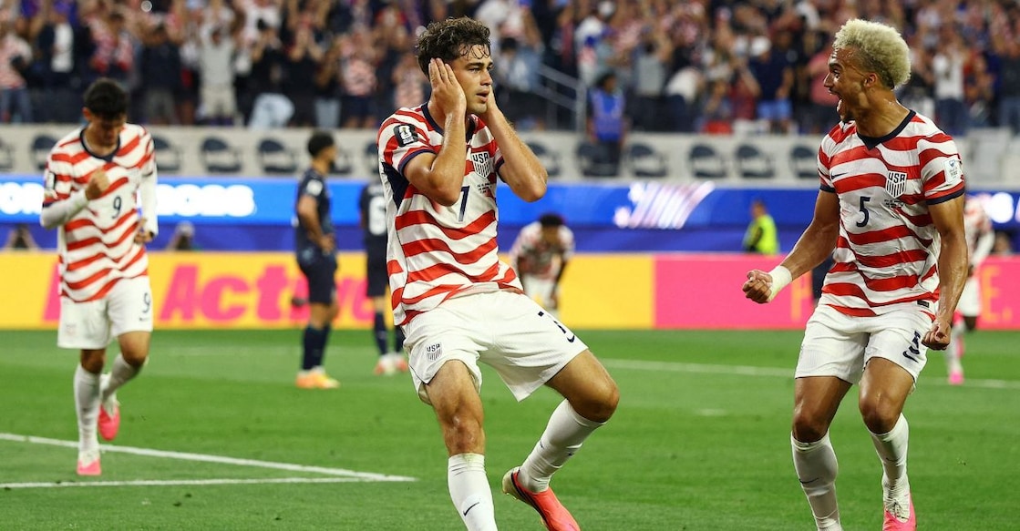 Giovanni Reyna of the US celebrates scoring their fourth goal with Antonee Robinson. Photo: Reuters.