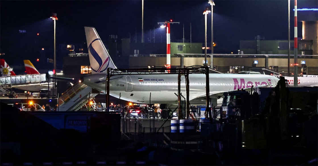 A convoy next to a plane after it landed, carrying an Iranian delegation led by chief negotiator Mohammad Baqer Qalibaf and Foreign Minister Abbas Araqchi, at the Zurich International Airport in Zurich, Switzerland. Photo: REUTERS/Denis Balibouse