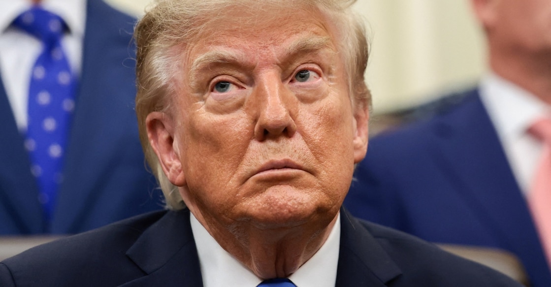 U.S. President Donald Trump looks on as he meets with travel executives in the Oval Office at the White House in Washington, D.C., U.S. on September 2. Photo: Reuters