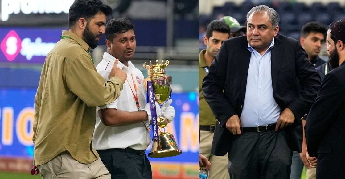 A file photo of ACC staff leaving with the trophy (L), ACC chairman Mohsin Naqvi at the venue after the final. Photo: AP /Altaf Qadri

