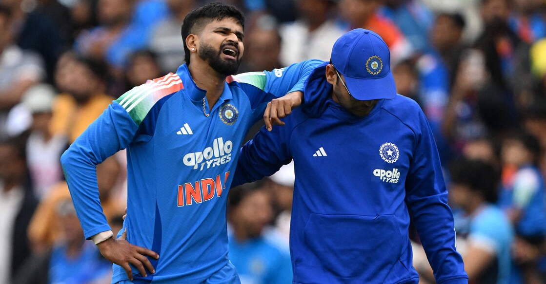 A file photo taken on October 25, 2025 shows India's Shreyas Iyer reacting in pain as he leaves the field during the third ODI against Australia at the Sydney Cricket Ground in Sydney. Photo: AFP/ Saeed Khan