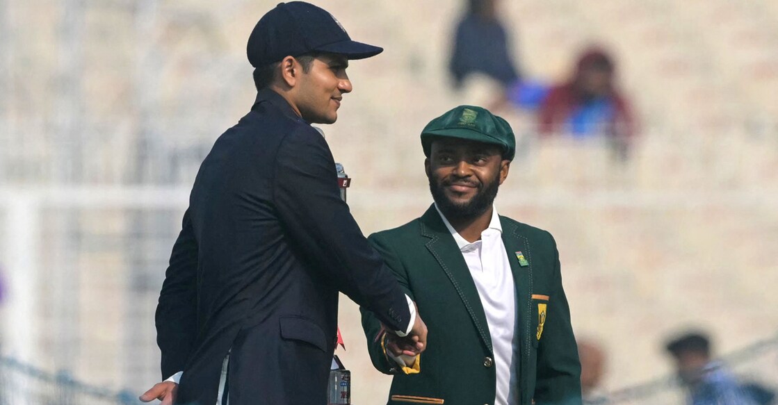 South African captain Temba Bavuma (right) shakes hand with his Indian counterpart Shubman Gill after toss during the first day of the first Test at the Eden Gardens in Kolkata on November 14, 2025. Photo: AFP/ Dibyangshu Sarkar 