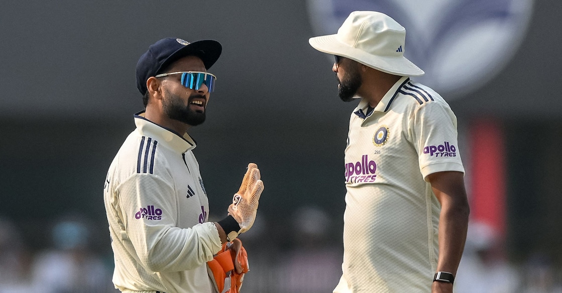 India's captain Rishabh Pant speaks with his teammate Mohammed Siraj during the second day of the second Test against South Africa at the Barsapara Cricket Stadium in Guwahati on November 23, 2025. Photo: AFP/ Biju Boro