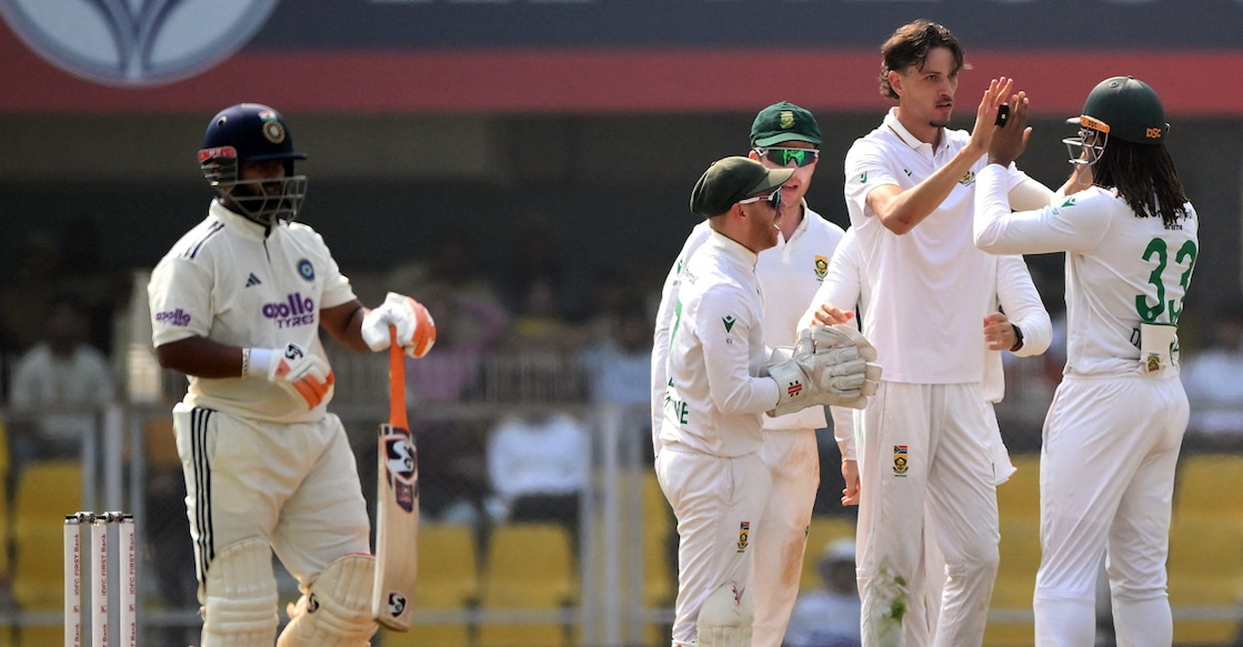 South Africa's Marco Jansen celebrates with teammates after taking the wicket of India's Rishabh Pant during the third day of the second Test at the Barsapara Cricket Stadium in Guwahati on November 24, 2025. Photo: AFP/ Biju Boro