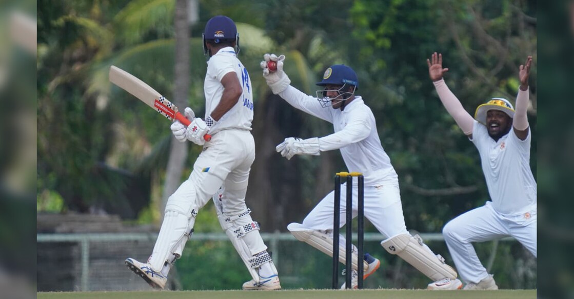 Karnataka players celebrate the dismissal of Kerala captain Mohammed Azharuddeen on Day 4 of their Ranji Trophy match at Mangalapuram in Thiruvananthapuram on November 4, 2025. Photo: KCA