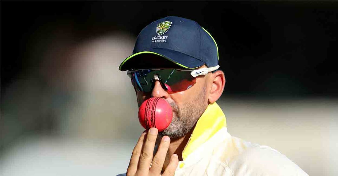 Australia's Nathan Lyon holds the pink ball during the tea break in the Ashes second test in Brisbane, Australia, in December 2025. File Photo: REUTERS/Hollie Adams