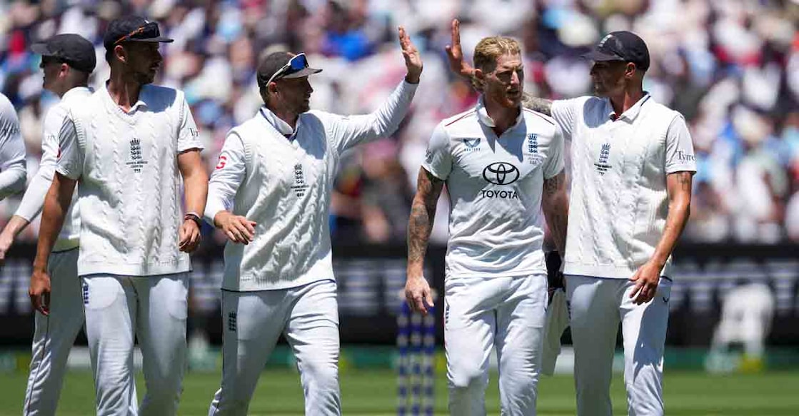 Cricket - The Ashes - Australia v England - Fourth Test -  MCG, Melbourne, Australia - December 27, 2025 England's Josh Tongue, Joe Root, Ben Stokes and Brydon Carse celebrate after taking the final wicket of Australia's 2nd innings REUTERS/Asanka Brendon Ratnayake