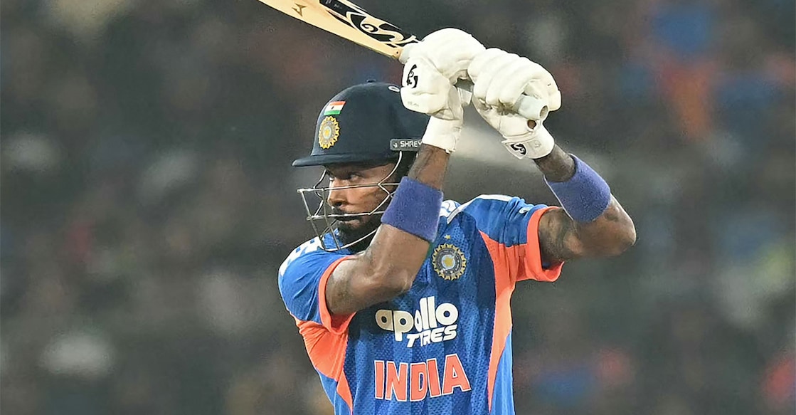 India's Hardik Pandya plays a shot during the first T20I against South Africa at the Barabati Stadium in Cuttack on December 9, 2025. Photo: AFP/ Noah Seelam