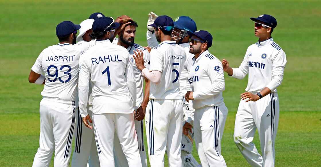 India's Akash Deep celebrates with teammates after taking the wicket of England's Harry Brook. Photo: Reuters/Peter Cziborra