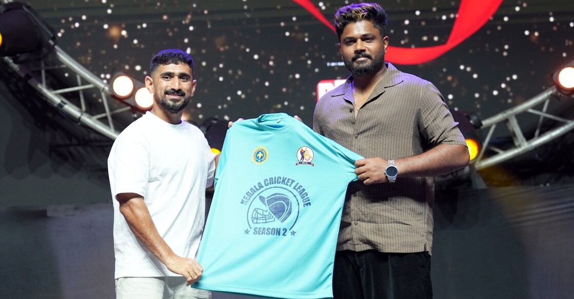 Sanju Samson (right) poses with Kerala cricketer Salman Nizar during the jersey launch of Kerala Cricket League (KCL) season-2 in Thiruvananthapuram on July 20, 2025. Photo: KCA