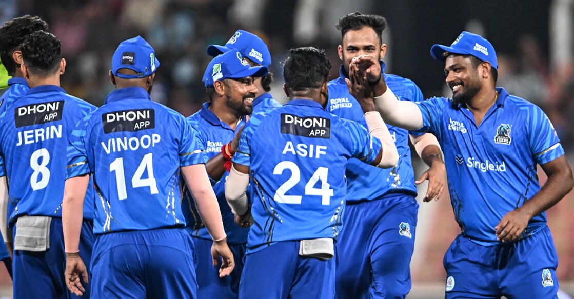 Sanju Samson celebrates a wicket of Trivandrum Royals with his Kochi Blue Tigers teammates during a Kerala Cricket League match at the Greenfield Stadium in Thiruvananthapuram on August 21, 2025. Photo: KCA