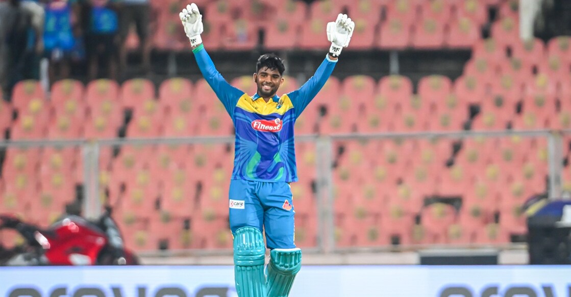 Thrissur Titans' Ahammed Imran celebrates after scoring a century against Calicut Globstars. Photo: KCA