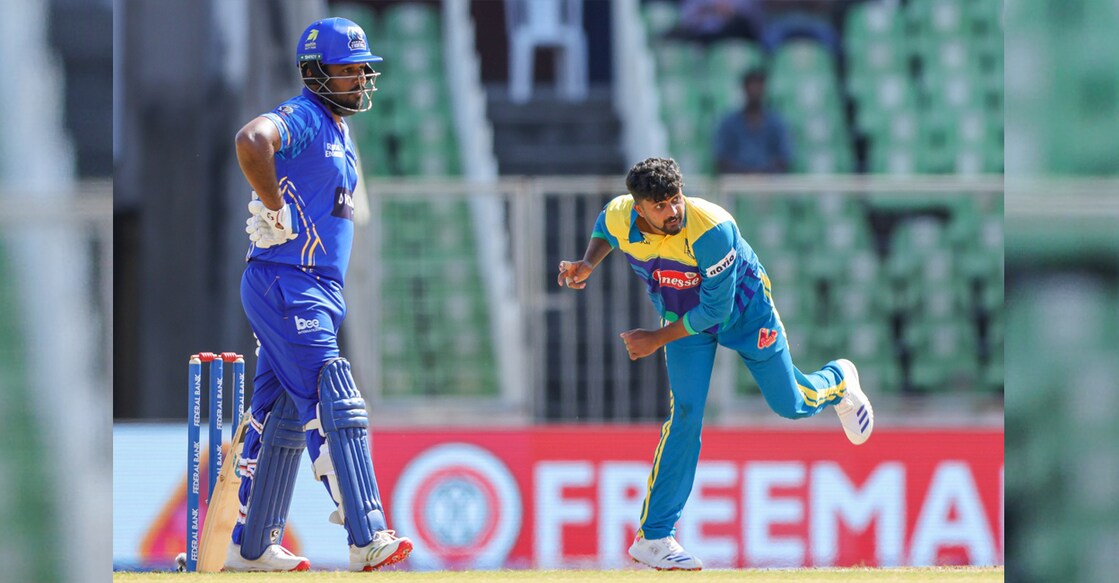 Kochi Blue Tigers’ Sanju Samson and Thrissur Titans’ Ajinas K in action during the Kerala Cricket League at the Greenfield Stadium in Thiruvananthapuram on August 26, 2025. Photo: KCA