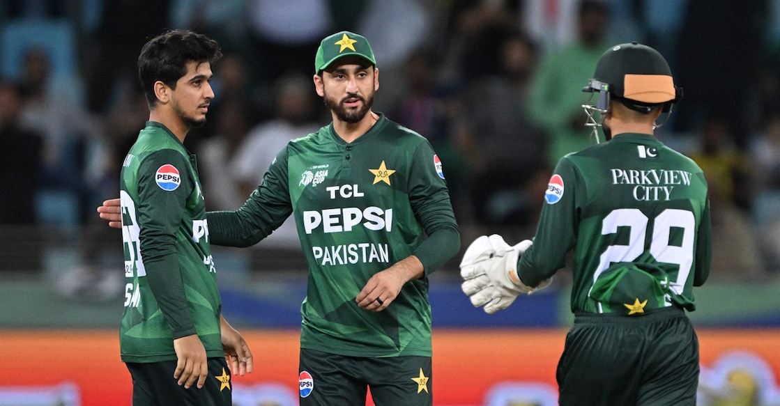 Pakistan's players celebrate the dismissal of Oman's captain Jatinder Singh during their Asia Cup 2025 Group A match at the Dubai International Stadium in Dubai on September 12, 2025. Photo: AFP/ Sajjad Hussain 