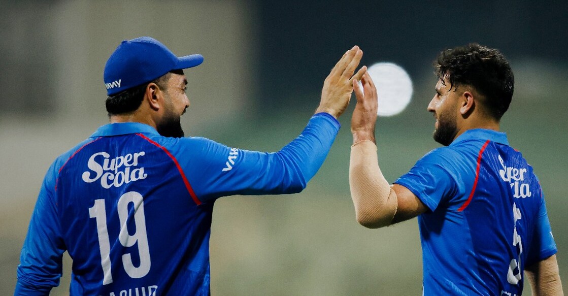 Afghanistan captain Rashid Khan celebrates a Hong Kong wicket with his teammate during the opening match of the AFC Asia Cup in Abu Dhabi on September 9, 2025. Photo: X/@ACCMedia1