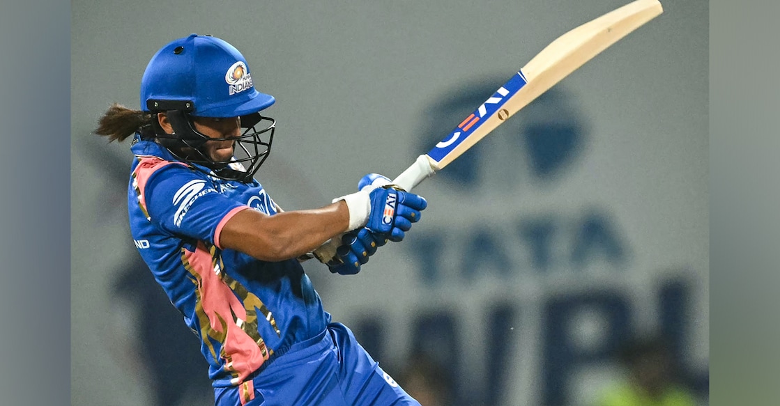 A file photo of Mumbai Indians' captain Harmanpreet Kaur in action against Delhi Capitals. Photo: AFP