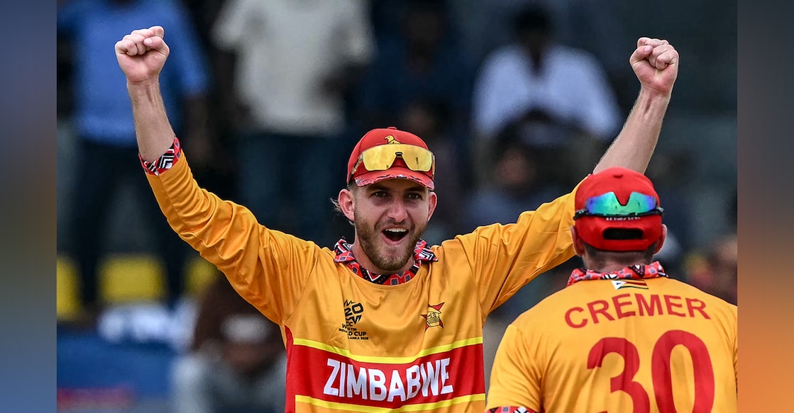 Zimbabwe's Brian Bennett (L) celebrates with teammate Graeme Cremer after their team's win against Australia in the 2026 ICC Men's T20 Cricket World Cup group stage match. Photo: AFP