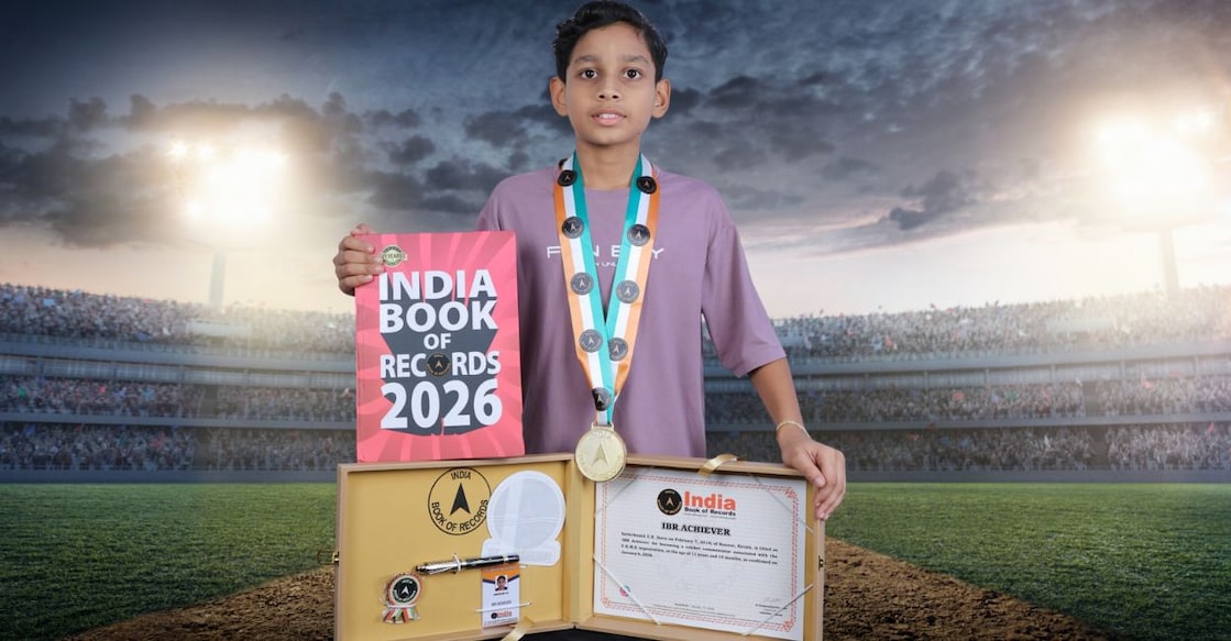 Sathviknath UK holding the medal for the record. Photo: Special arrangement