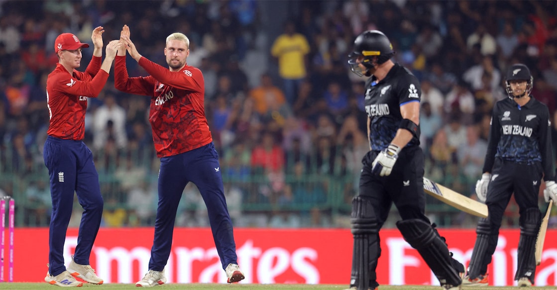 England's Will Jacks and Harry Brook celebrate after taking the wicket of New Zealand's Glenn Phillips. Photo: Reuters/Lahiru Harshana