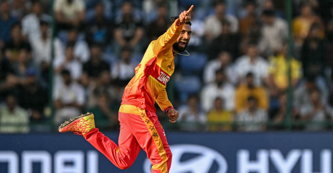 Zimbabwe's captain Sikandar Raza celebrates after taking the wicket of South Africa's captain Aiden Markram during the 2026 ICC Men's T20 Cricket World Cup Super Eights match in New Delhi on March 1, 2026. Photo: AFP/ Sajjad Hussai