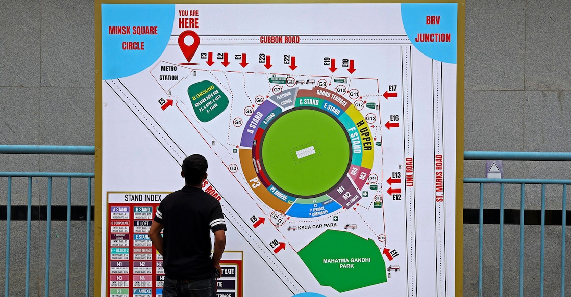 A man looks at the map of M Chinnaswamy Stadium after its security and infrastructural improvements ahead of Indian Premier League (IPL) 2026 in Bengaluru on March 23, 2026. Photo: PTI
