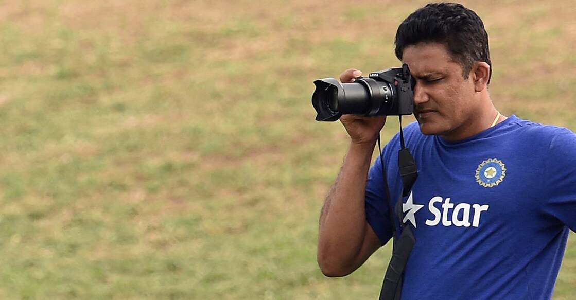 In this file photo from July 10, 2016, then Indian cricket team head coach Anil Kumble takes pictures during the second day of a two-day tour match between India and WICB President's XI squad at the Warner Park stadium in Basseterre, Saint Kitts. File photo: AFP/ Jewel Samad
