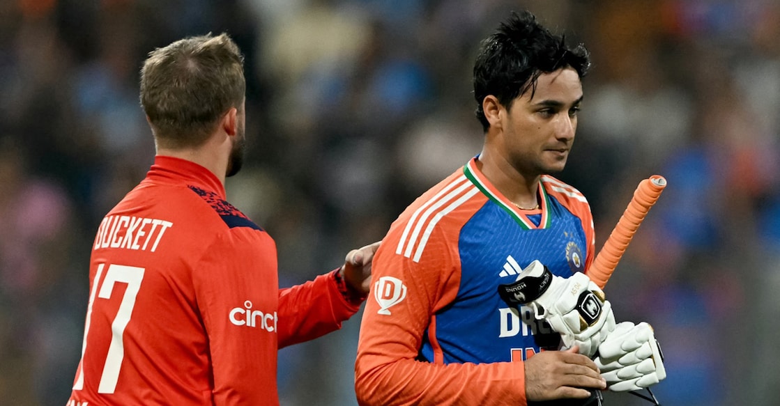 In this file photo from February 2, 2025, India's Abhishek Sharma is congratulated by England's Ben Duckett for his century during a T20I match at the Wankhede Stadium in Mumbai. Photo: AFP/ Punit Paranjpe 