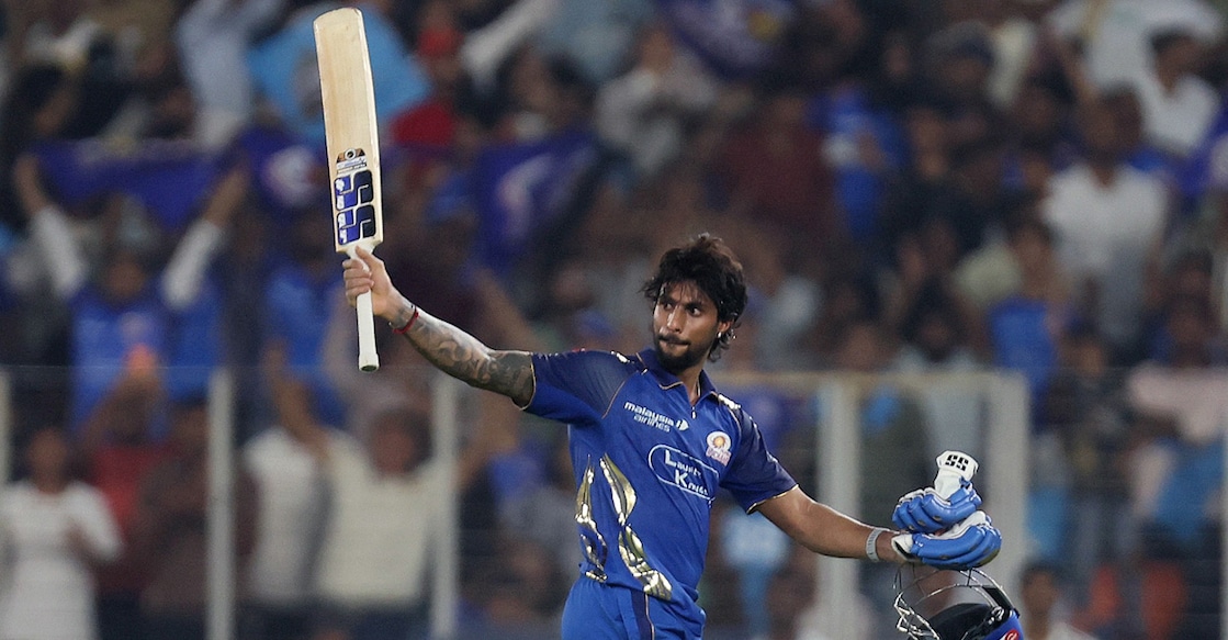 Mumbai Indians' Tilak Varma celebrates after reaching his century against the Gujarat Titans. Photo: Reuters/Amit Dave