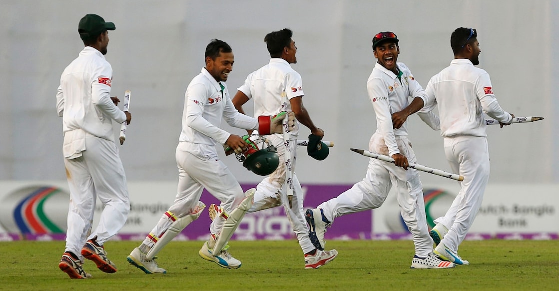 Bangladesh's players celebrate after winning the match. Photo: Reuters
