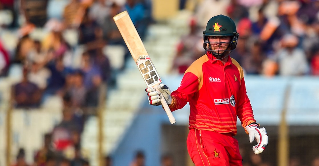Zimbabwe cricketer Brendan Taylor celebrates his half century (50 runs) during the second one day international (ODI) cricket match between Bangladesh and Zimbabwe at the Zahur Ahmed Chowdhury Stadium in Chittagong on October 24, 2018. (Photo by MUNIR UZ ZAMAN / AFP)