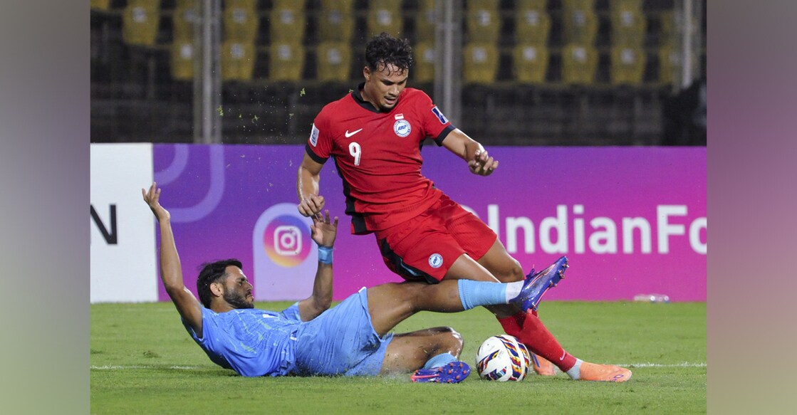 India and Singapore players vie for the ball during their 2027 AFC Asian Cup qualifier. Photo: PTI