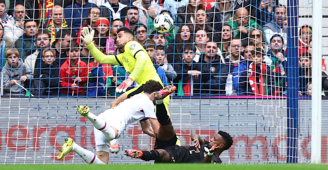 Armenia's Eduard Spertsyan scores their first goal past Portugal's Diogo Costa and Nelson Semedo. Photo: REUTERS/Pedro Nunes