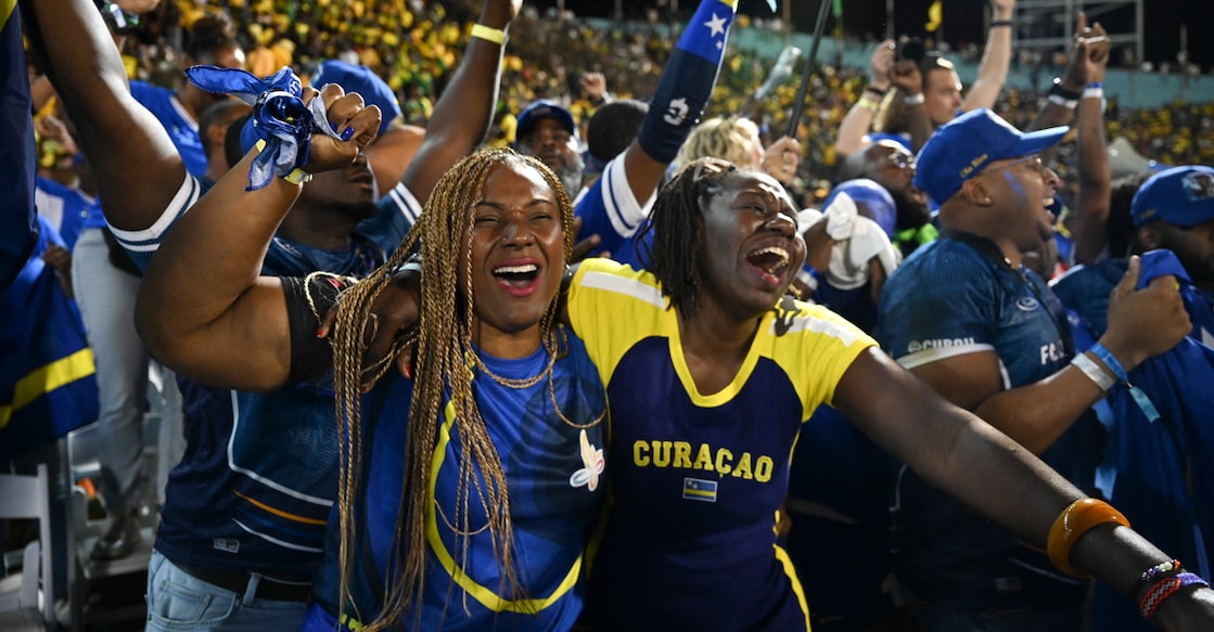 Curacao fans celebrate World Cup 2026 qualification after a 0-0 draw with Jamaica at the National Stadium in Kingston, Jamaica on November 18, 2025. Photo: AFP