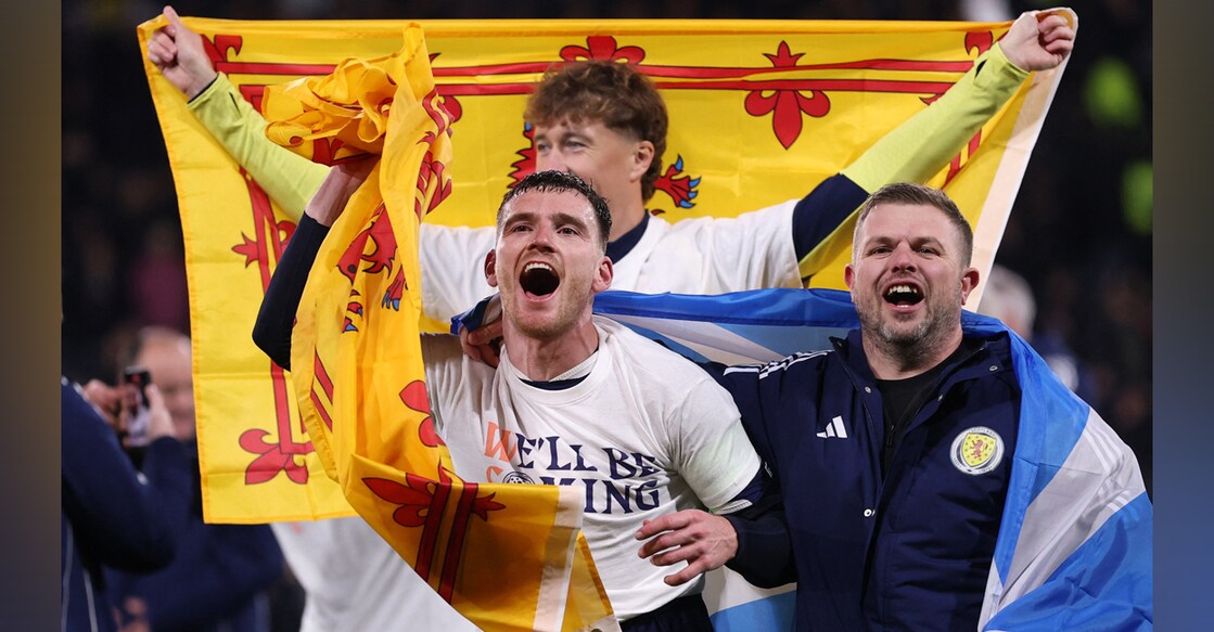 Scotland's Andrew Robertson celebrates after they qualify for the World Cup. Photo: Reuters
