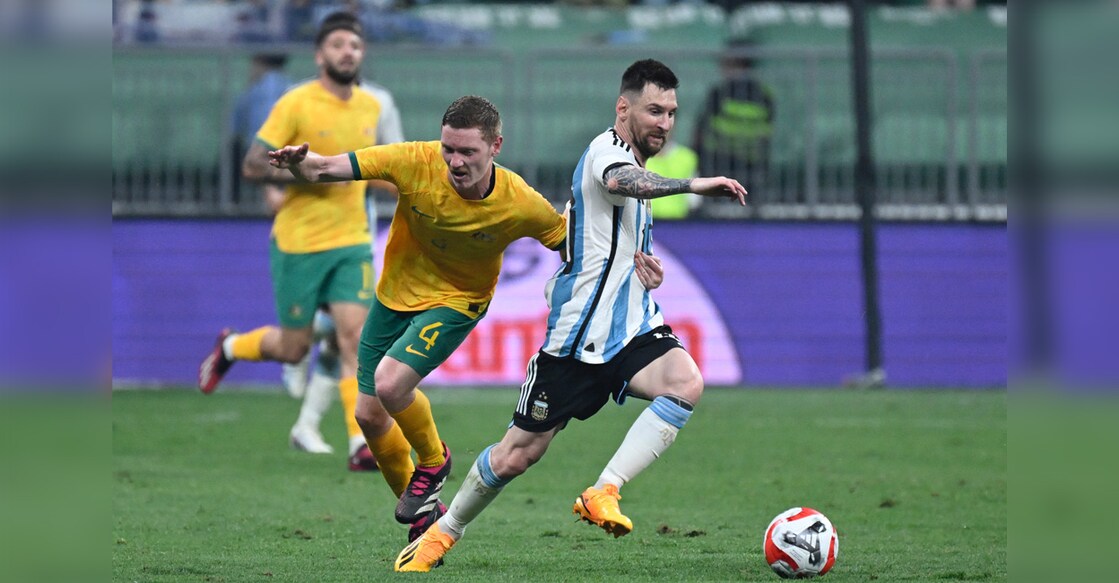 Argentina's Lionel Messi fights for the ball during a friendly football match against Australia at the Workers' Stadium in Beijing on June 15, 2023. File photo: AFP/ Wang Zhao