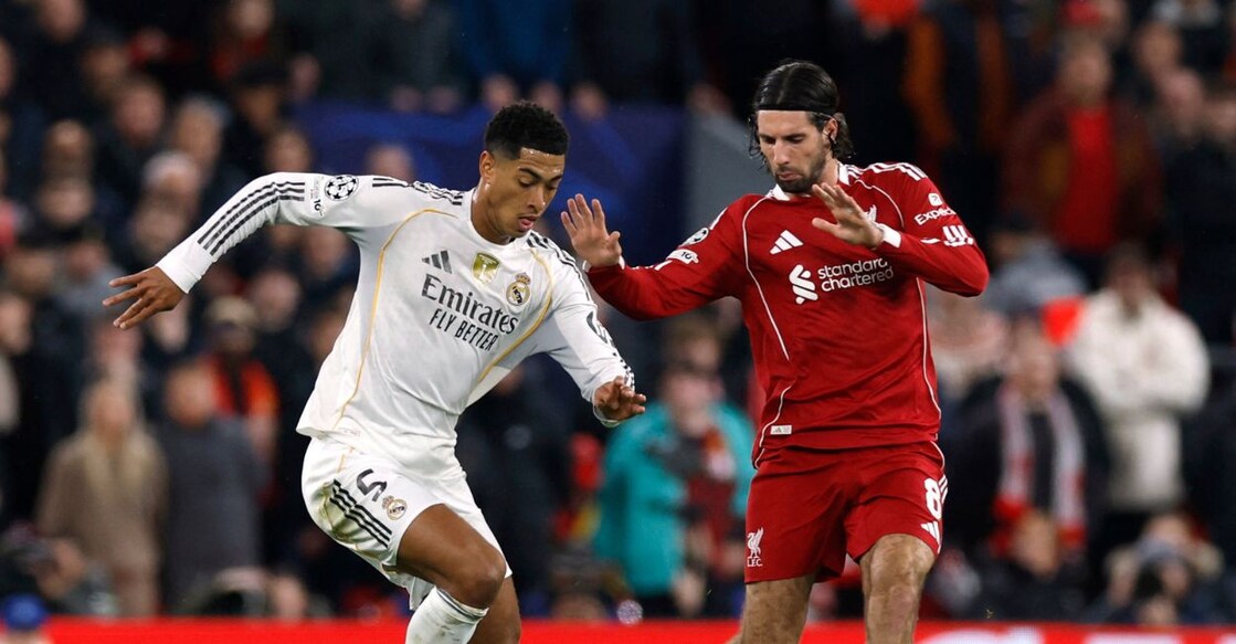Real Madrid's Jude Bellingham in action with Liverpool's Dominik Szoboszlai, Liverpool v Real Madrid - Anfield, Liverpool, Britain - November 4, 2025. Photo: Reuters 