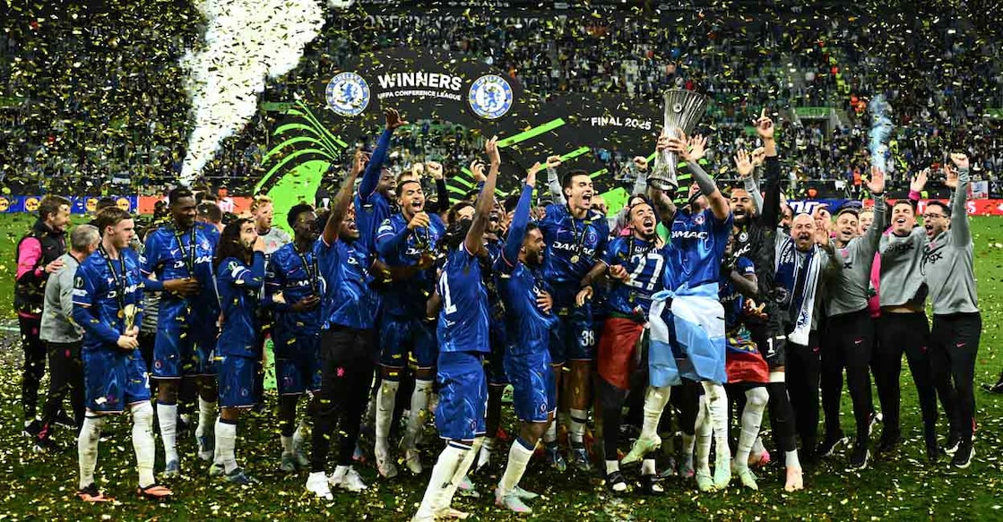 Chelsea's Enzo Fernandez celebrates with the trophy and teammates after winning the Conference League. Photo: REUTERS/Dylan Martinez