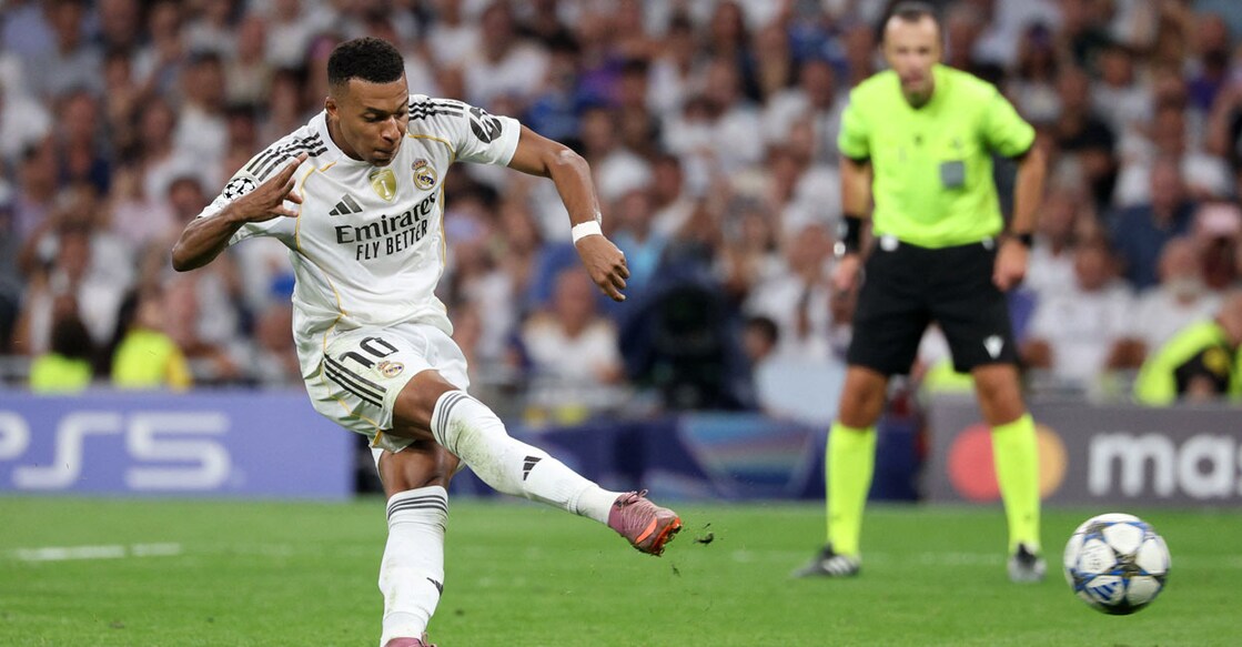 Real Madrid's Kylian Mbappe scores their second goal from the penalty spot. Photo: REUTERS/Juan Medina
