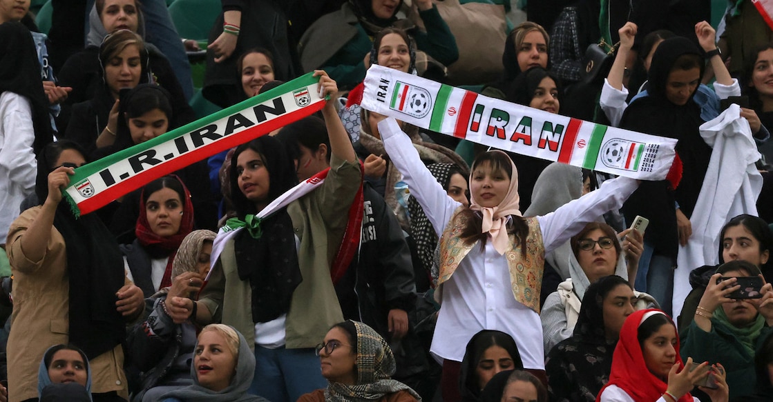 In this file photo from March 20, 2025, Iran fans cheer ahead of the FIFA World Cup 2026 Asia zone qualifiers group A football match between Iran and the United Arab Emirates at the Azadi Sports Complex in Tehran. File photo: AFP/ Atta Kenare 