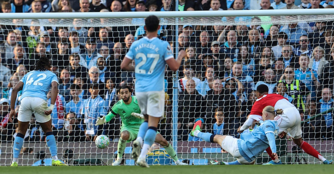 Manchester City's  Erling Haaland shoots to score his team's second goal during the English Premier League football match against Arsenal at the Etihad Stadium in Manchester on April 19, 2026. Photo: AFP/ Darren Staples
