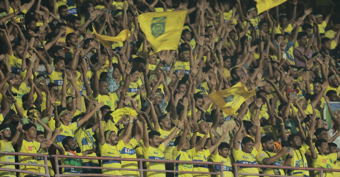 A file photo of Kerala Blasters fans cheering for their team from a gallery of the Jawaharlal Nehru International Stadium in Kochi. File photo: Manorama