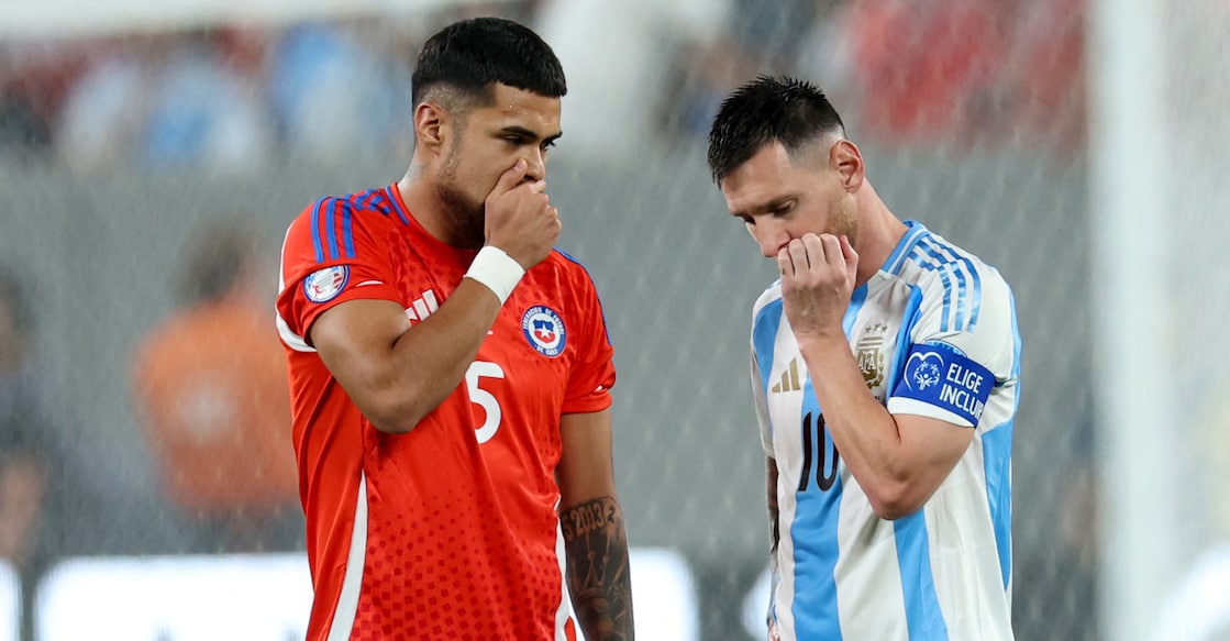 In this file photo from June 25, 2024, used for representational purposes, Chile’s Paulo Diaz and Argentina's Lionel Messi talk while covering their mouths during the Conmebol 2024 Copa America tournament group A match at the MetLife Stadium in East Rutherford, New Jersey. File photo: AFP/ Charly Triballeau