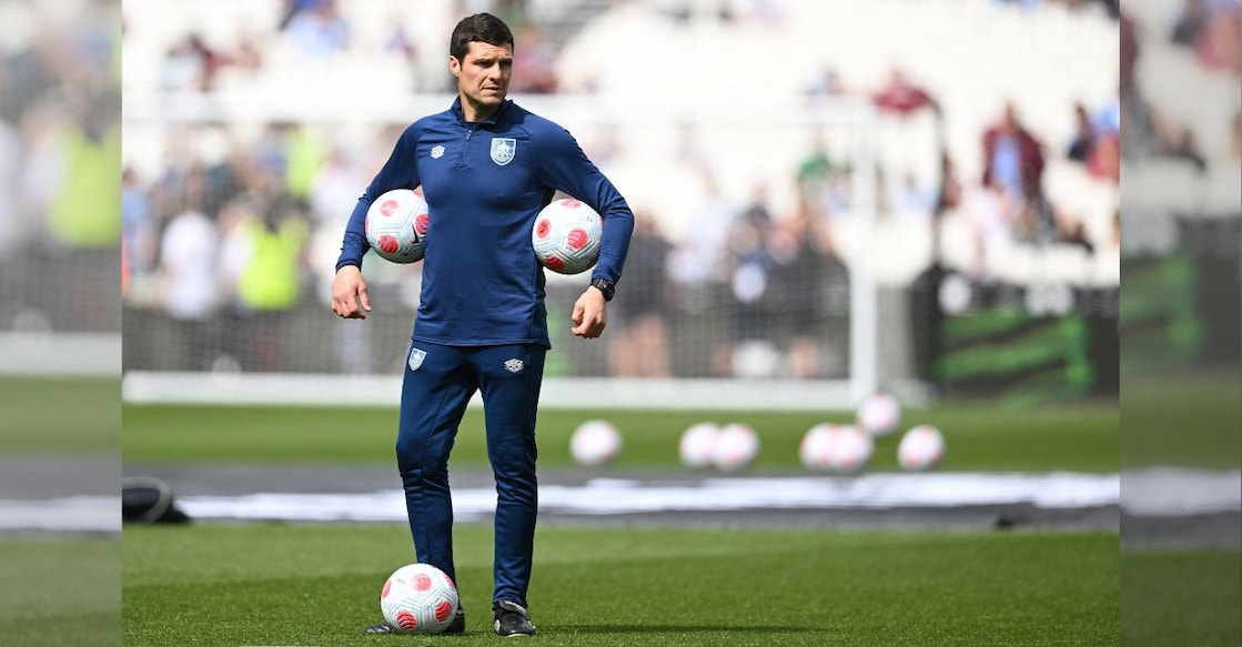 A file photo of Burnley's Interim manager Mike Jackson during the warm up session prior to the Premier League football match against West Ham United at the London Stadium, in London on April 17, 2022. Photo: AFP