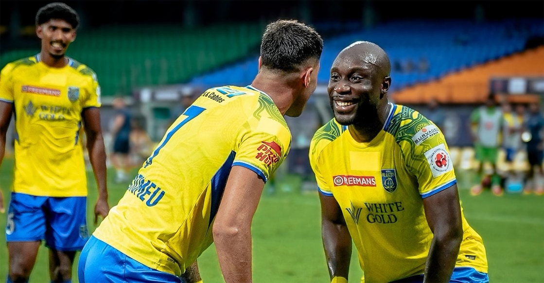 Kevin Yoke celebrates a Kerala Blasters goal with Victor Bertomeu during the match against Mohammedan SC at the Jawaharlal Nehru Stadium in Kochi on May 10, 2026. Photo: KBFC