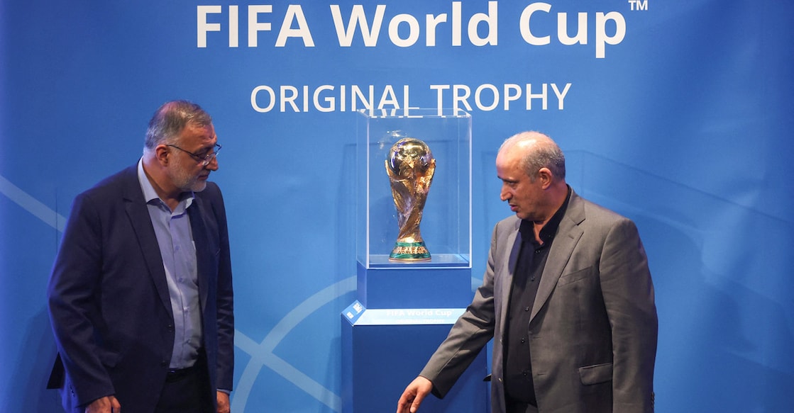 President of Iran Football Federation Mehdi Taj and Mayor of Tehran Alireza Zakani stand next to the FIFA World Cup Trophy during an unveiling ceremony in Tehran, Iran, September 1, 2022. File photo: Majid Asgaripour/West Asia News Agency via Reuters