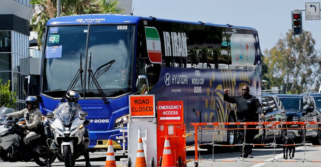 The Iran team bus arrives at the hotel with a police escort. Photo: Reuters